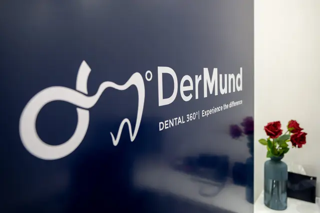 DerMund logo wall in the clinic